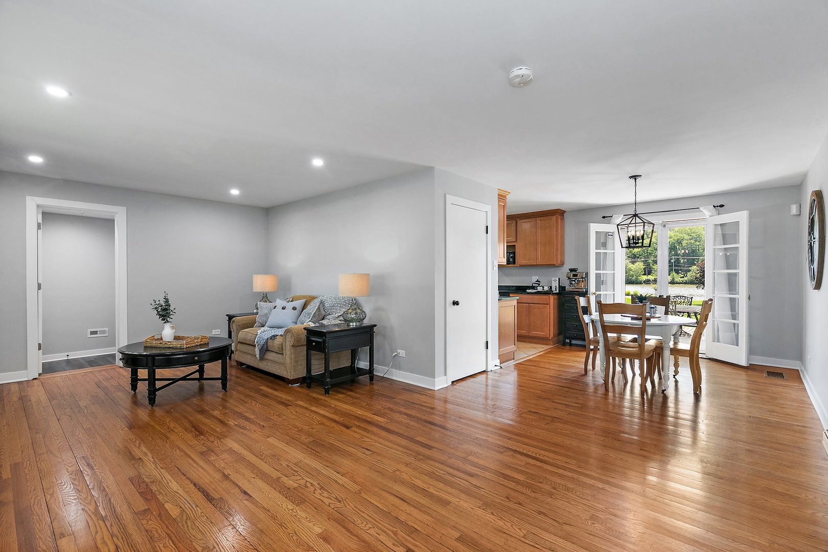 1037 North Harrison Street Algonquin, IL 60102 - Photo 4 of 46 a living room with furniture and a wooden floor