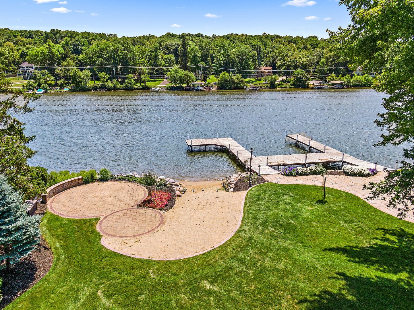 1037 North Harrison Street Algonquin, IL 60102 - Photo 44 of 46 an aerial view of a house with a yard and lake view
