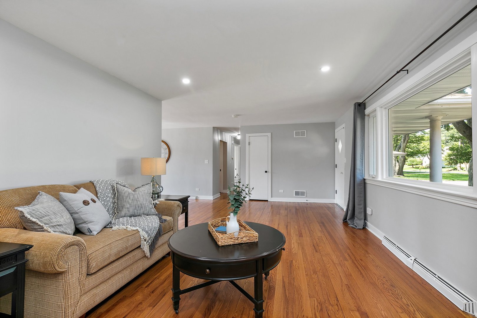 1037 North Harrison Street Algonquin, IL 60102 - Photo 5 of 46 a living room with furniture and a large window