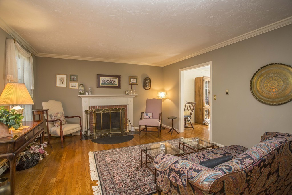15 Virginia Ridge Road Sudbury, MA 01776 - Photo 7 of 16 a bed room with a bed and a fireplace