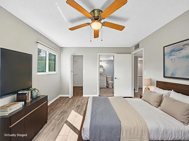 a view of hallway with wooden floor