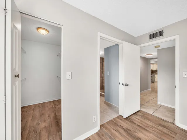 a view of a room with racks on the wall