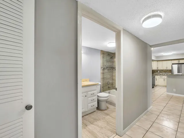 a view of kitchen with furniture and cabinets