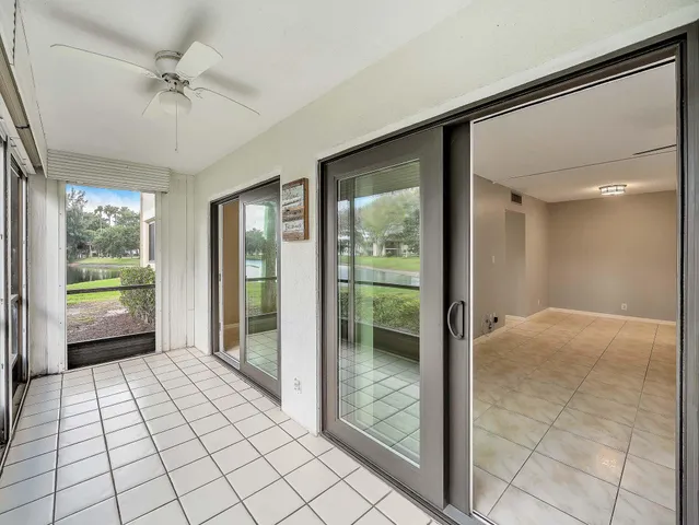 a view of a porch and garden