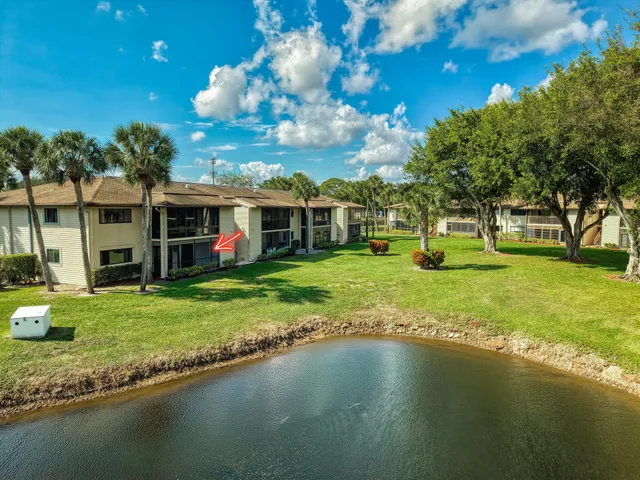 a front view of house with an outdoor space and seating