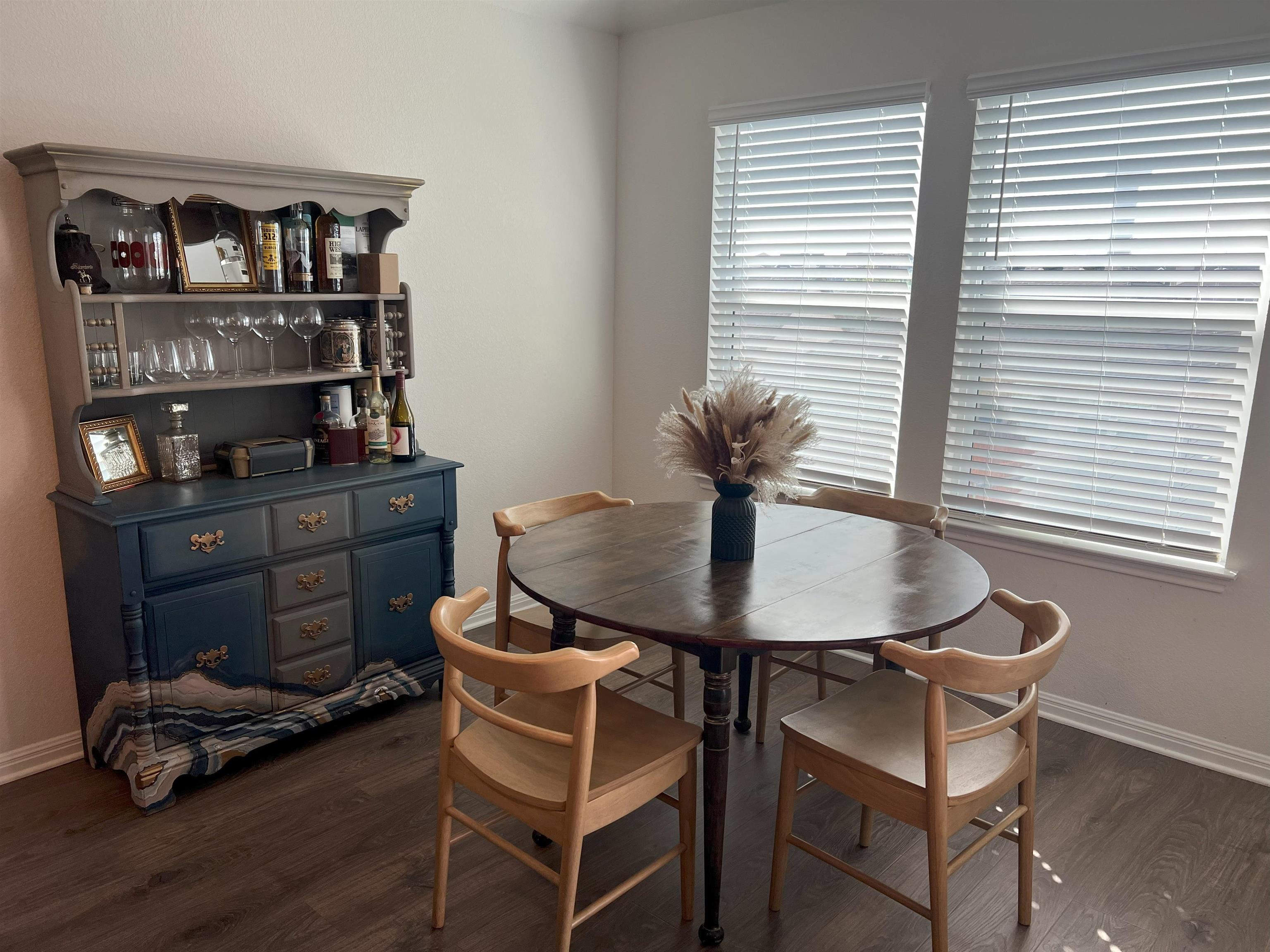 248 Lone Cedar Road Marble Falls, TX 78654 - Photo 17 of 30 a dining room with furniture and wooden floor
