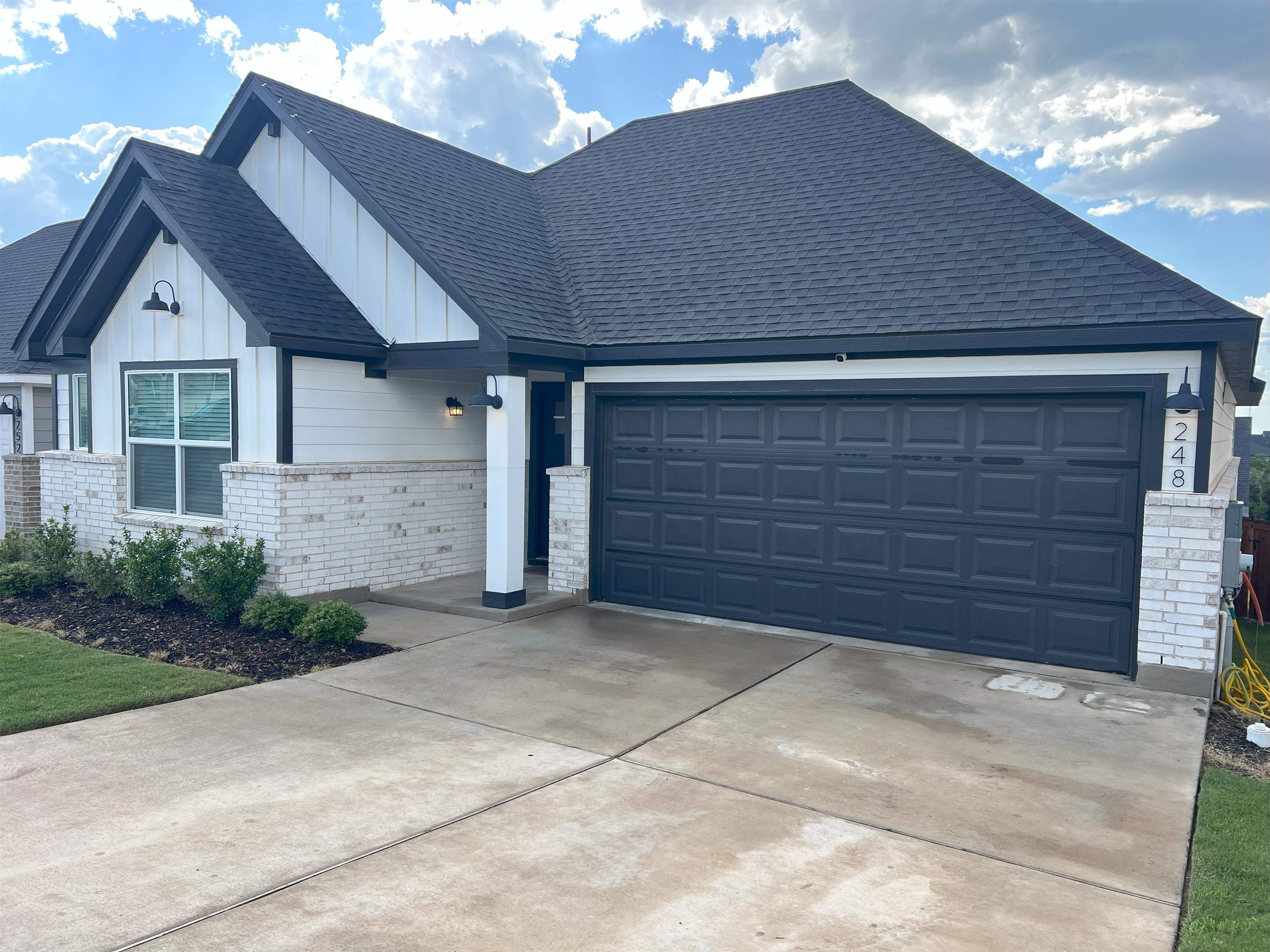 248 Lone Cedar Road Marble Falls, TX 78654 - Photo 2 of 30 a house view with a outdoor space