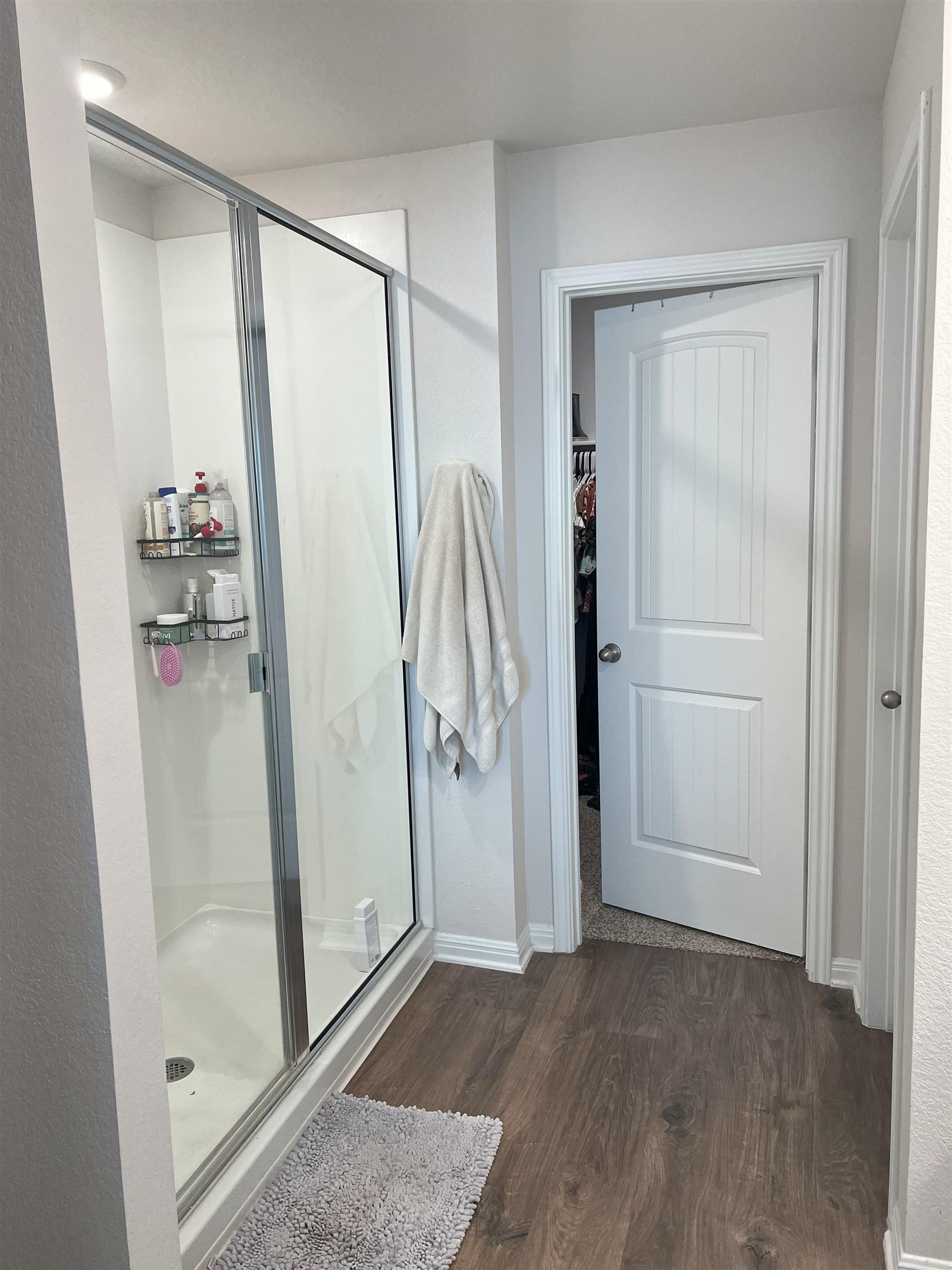 248 Lone Cedar Road Marble Falls, TX 78654 - Photo 22 of 30 an empty room with wooden floor and a glass door