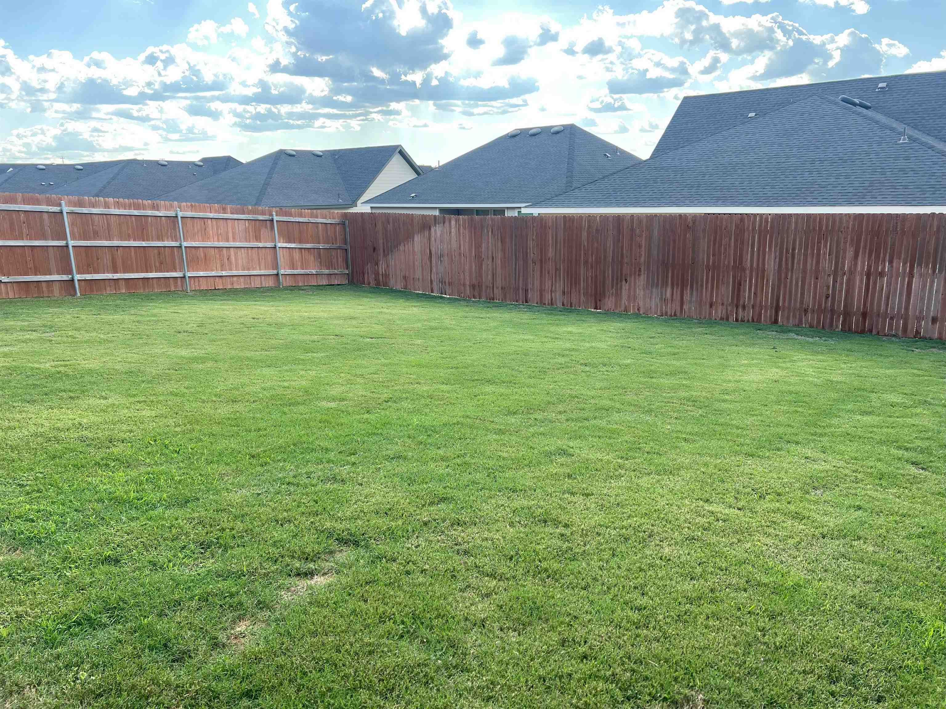 248 Lone Cedar Road Marble Falls, TX 78654 - Photo 28 of 30 a view of a backyard with a cabin