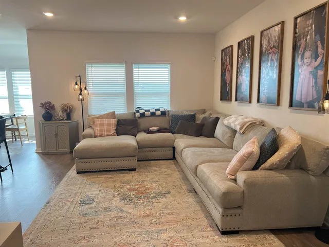 a living room with furniture and a couch