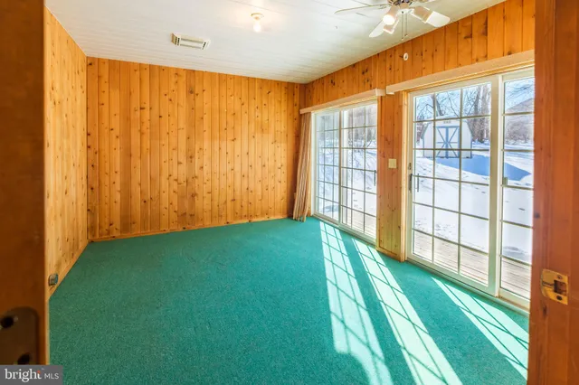a view of an empty room with window