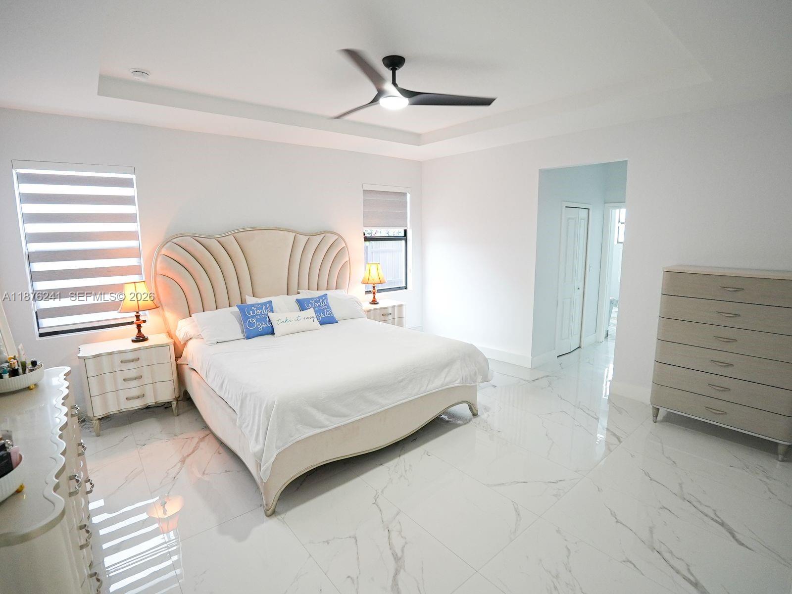 14478 Southwest 21st Street Miami, FL 33175 - Photo 28 of 42 a bedroom with a bed and a dresser