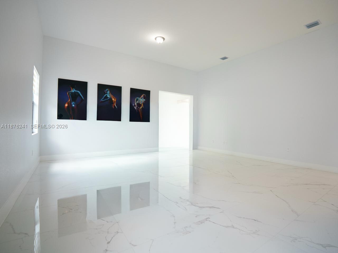 14478 Southwest 21st Street Miami, FL 33175 - Photo 35 of 42 a elevator with window