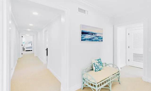 a bed room with a bed and a flat tv screen