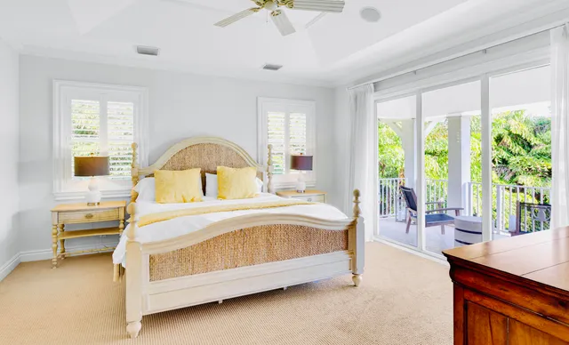 a spacious bathroom with a tub sink shower and mirror
