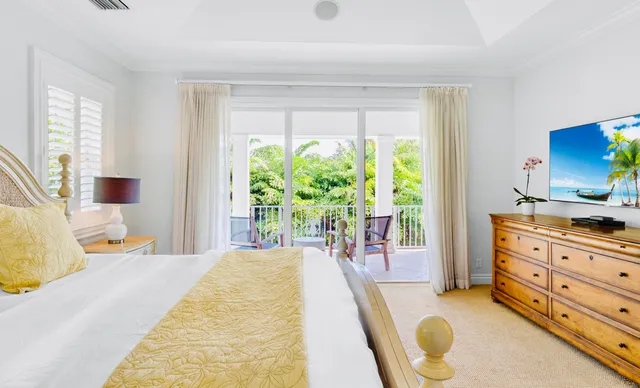 a view of a swimming pool with a yard