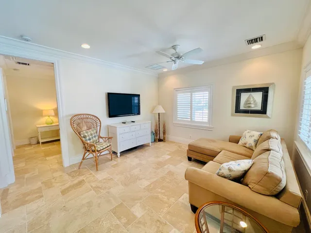 a view of a swimming pool with lounge chair