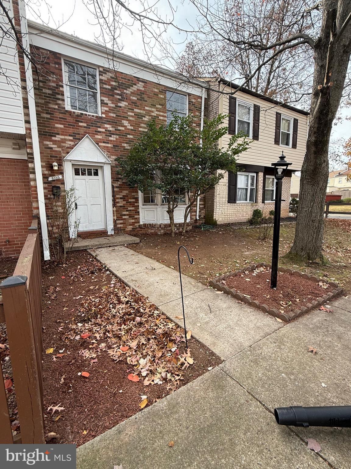 8355 Irongate Way Manassas, VA 20109 - Photo 1 of 1 a view of a house with a yard and garage