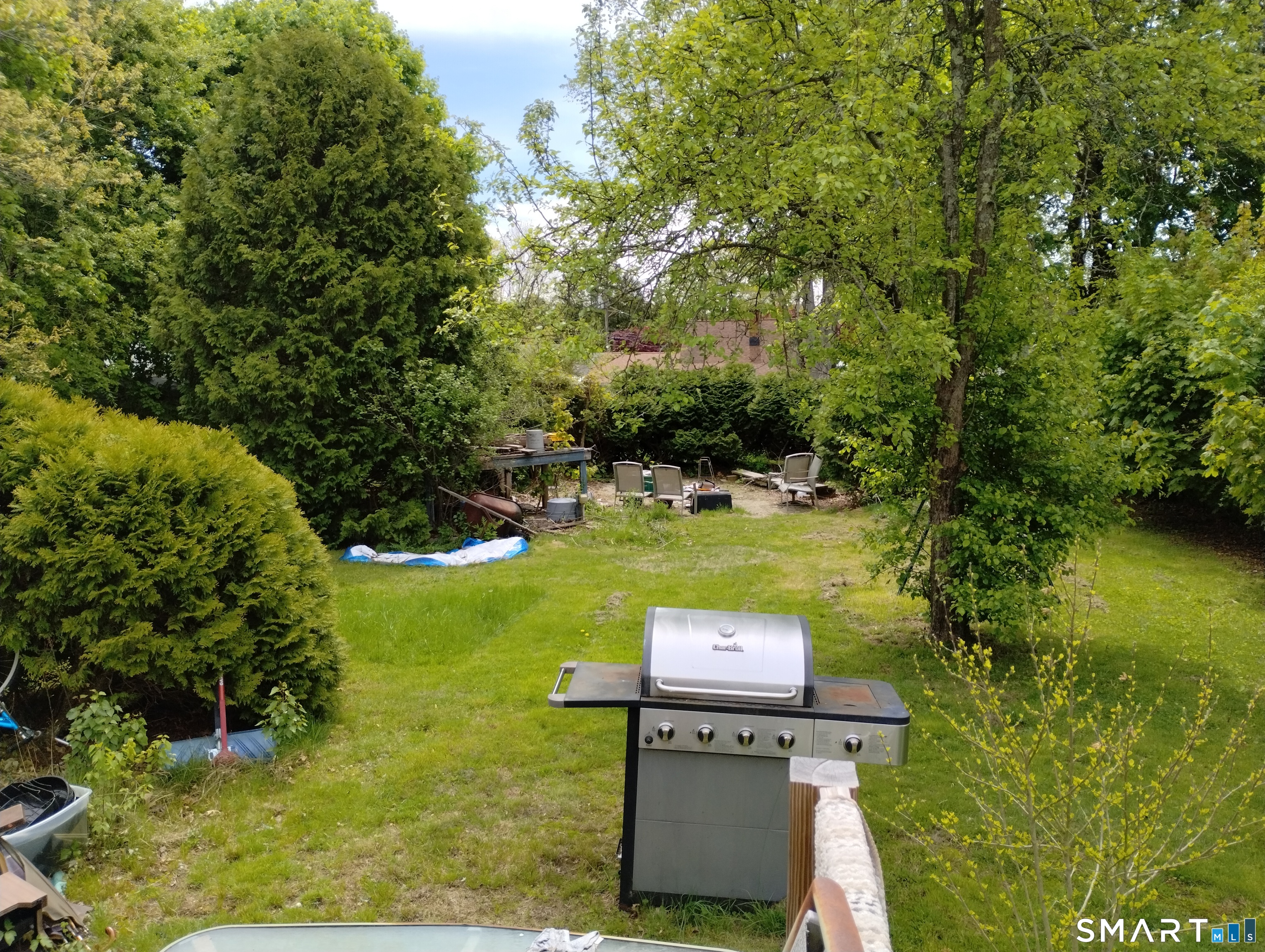 37 Ruth Street Killingly, CT 06239 - Photo 8 of 9 a view of a table and chairs in the garden