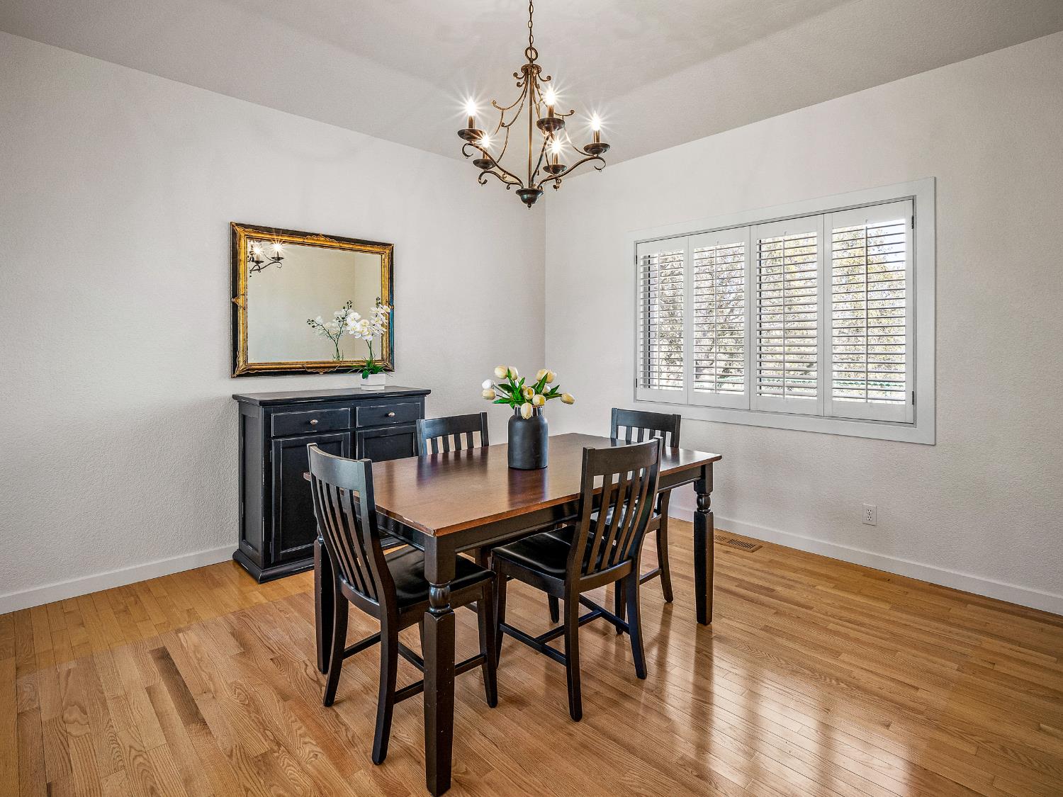 5373 Prairie Loop Placerville, CA 95667 - Photo 7 of 32 Formal dining room with white plantation shutters.