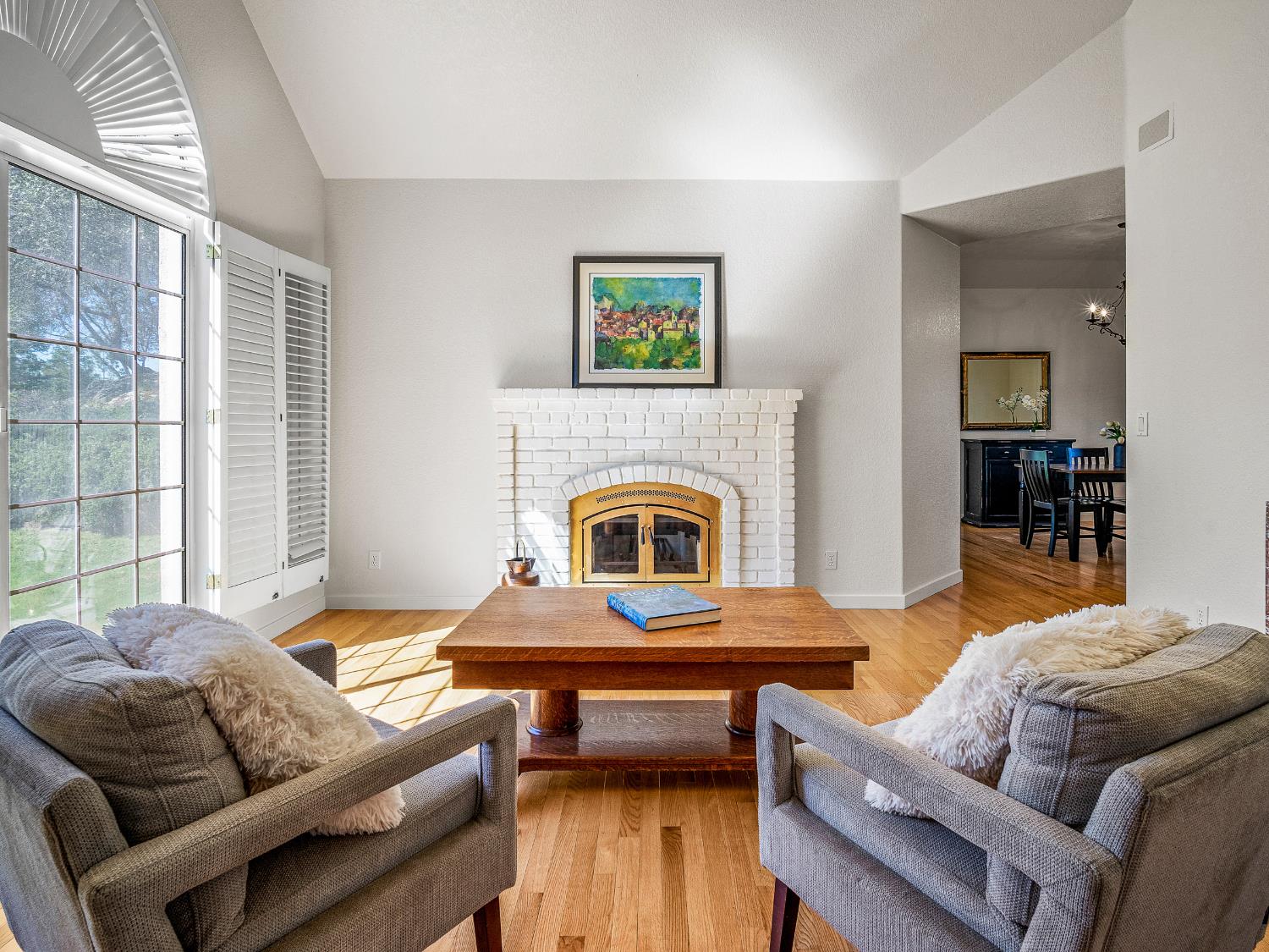 5373 Prairie Loop Placerville, CA 95667 - Photo 9 of 32 Front living room featuring wood burning fireplace and huge picture windows.