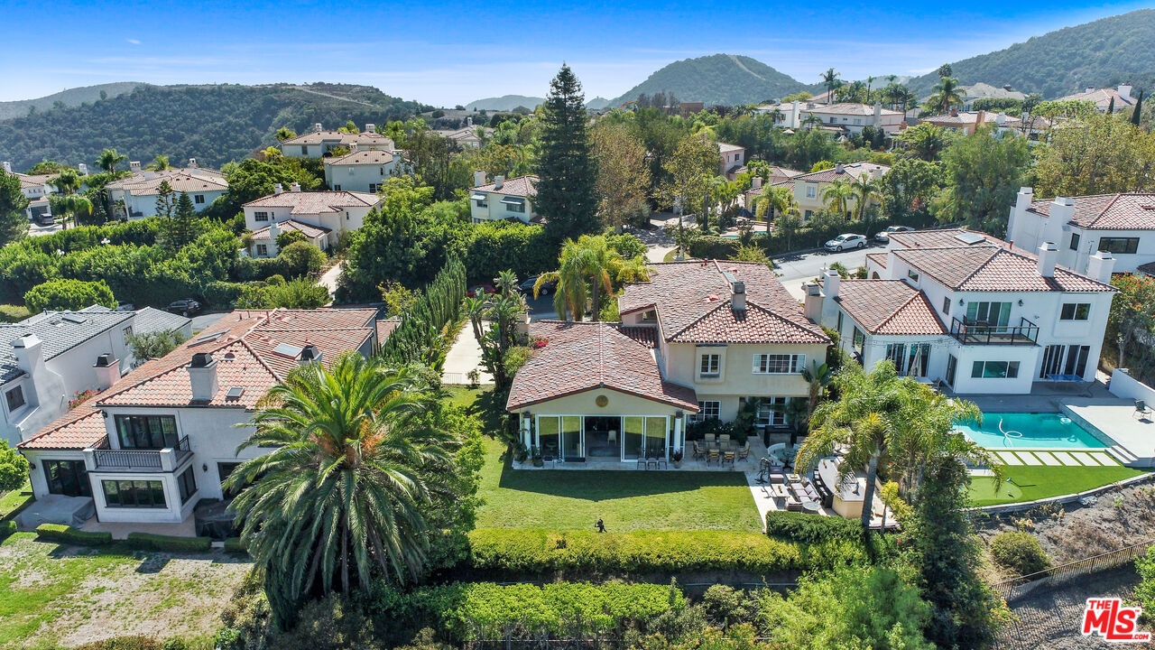 12535 Promontory Road Los Angeles, CA 90049 - Photo 40 of 42 an aerial view of multiple houses