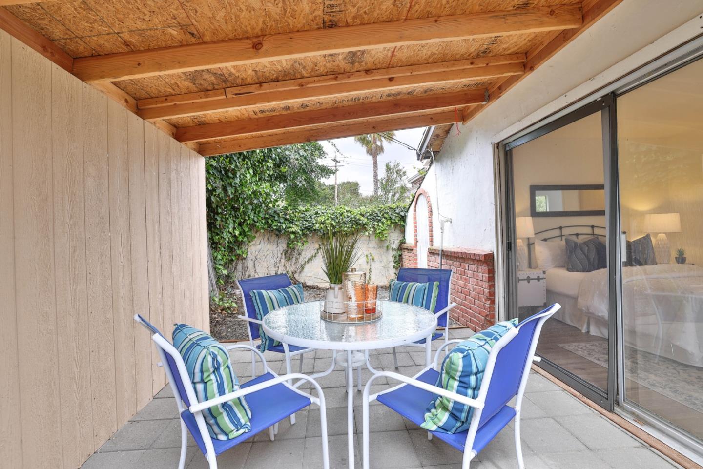 10036 Carmen Road Cupertino, CA 95014 - Photo 8 of 17 a view of a dining room with furniture window and outside view