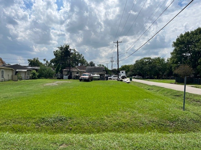 0 Firefly Street Houston, TX 77017 - Photo 3 of 4 a view of yard with swimming pool and green space