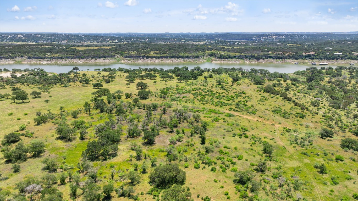 6 Dos Rios Way Marble Falls, TX 78654 - Photo 15 of 28 a view of a city with an ocean beach