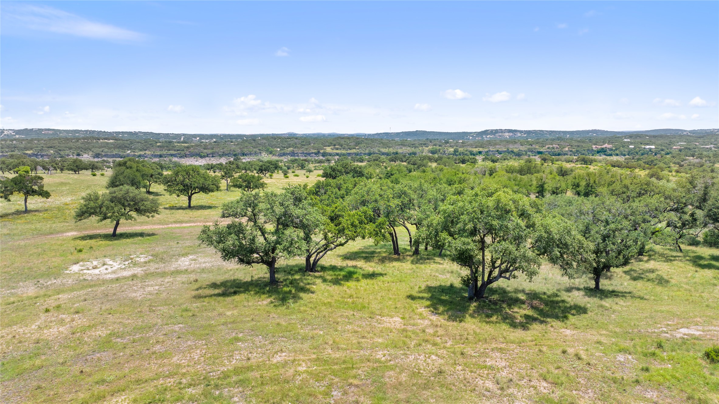 6 Dos Rios Way Marble Falls, TX 78654 - Photo 25 of 28 a view of a town with mountains in the background