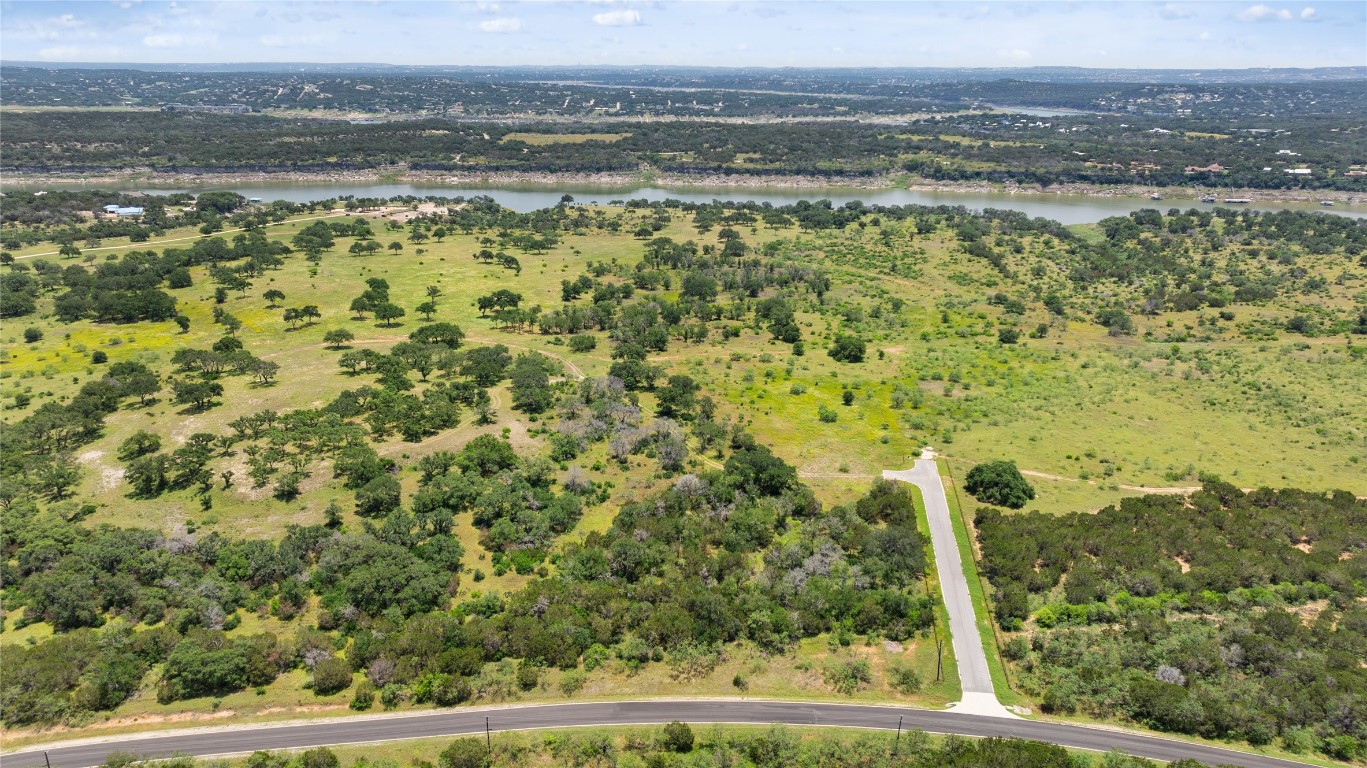 6 Dos Rios Way Marble Falls, TX 78654 - Photo 26 of 28 a view of a lake with a mountain in the background