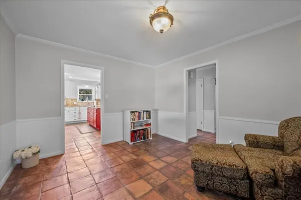 a bedroom with a bed and cabinets