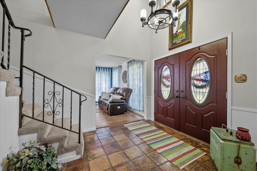 3400 Obrien Circle Waco, TX 76708 - Photo 6 of 36 a view of staircase with a table and a chandelier