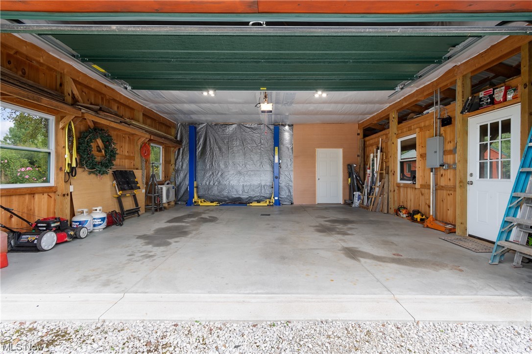 8205 Lake Road Seville, OH 44273 - Photo 33 of 35 Interior of 24'x40' pole barn including a car lift
