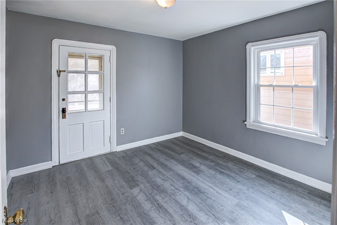 3423 Westbury Road Cleveland, OH 44120 - Photo 11 of 38 Unfurnished room featuring dark wood-type flooring