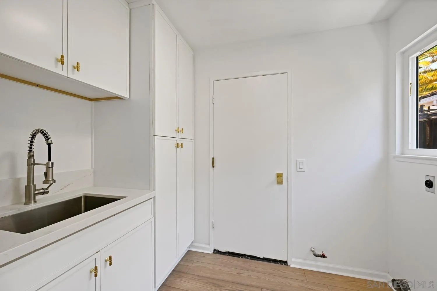13010 Pomard Way Poway, CA 92064 - Photo 16 of 22 a kitchen with a sink and cabinets