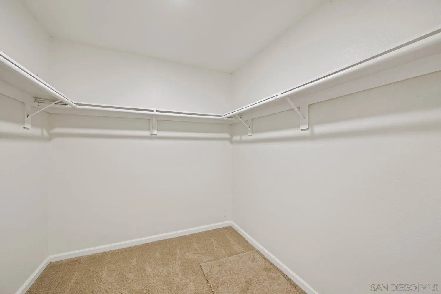 13010 Pomard Way Poway, CA 92064 - Photo 17 of 22 a view of a room with shelf on the wall