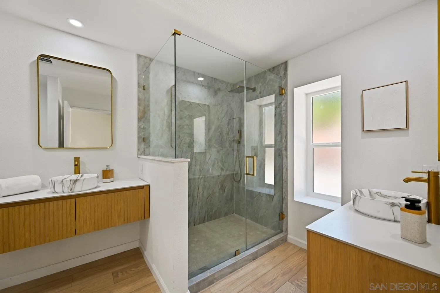 13010 Pomard Way Poway, CA 92064 - Photo 18 of 22 a bathroom with a sink mirror and shower