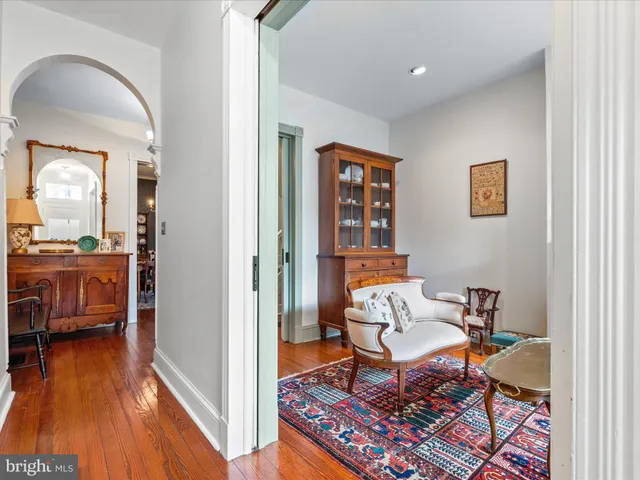 a view of a living room and dining room