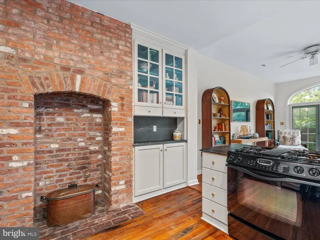 a kitchen with stainless steel appliances a stove and a refrigerator