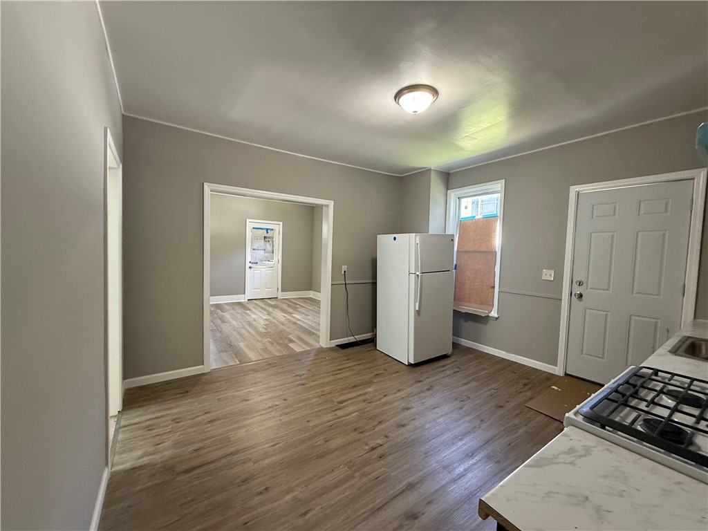 4 Lake Avenue, Unit 1 Auburn, NY 13021 - Photo 5 of 13 Kitchen and Living Room View