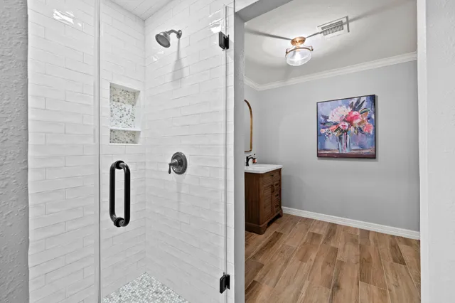 a bathroom with a toilet sink and vanity