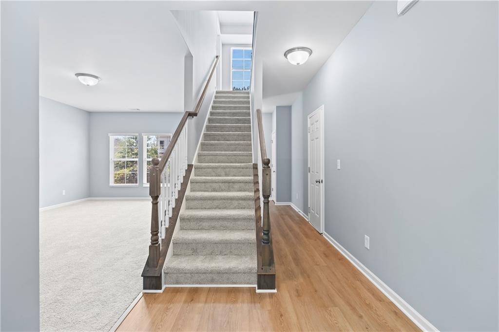 71 Moonrise Crossing Dallas, GA 30132 - Photo 19 of 64 a view of entryway and hall with wooden floor