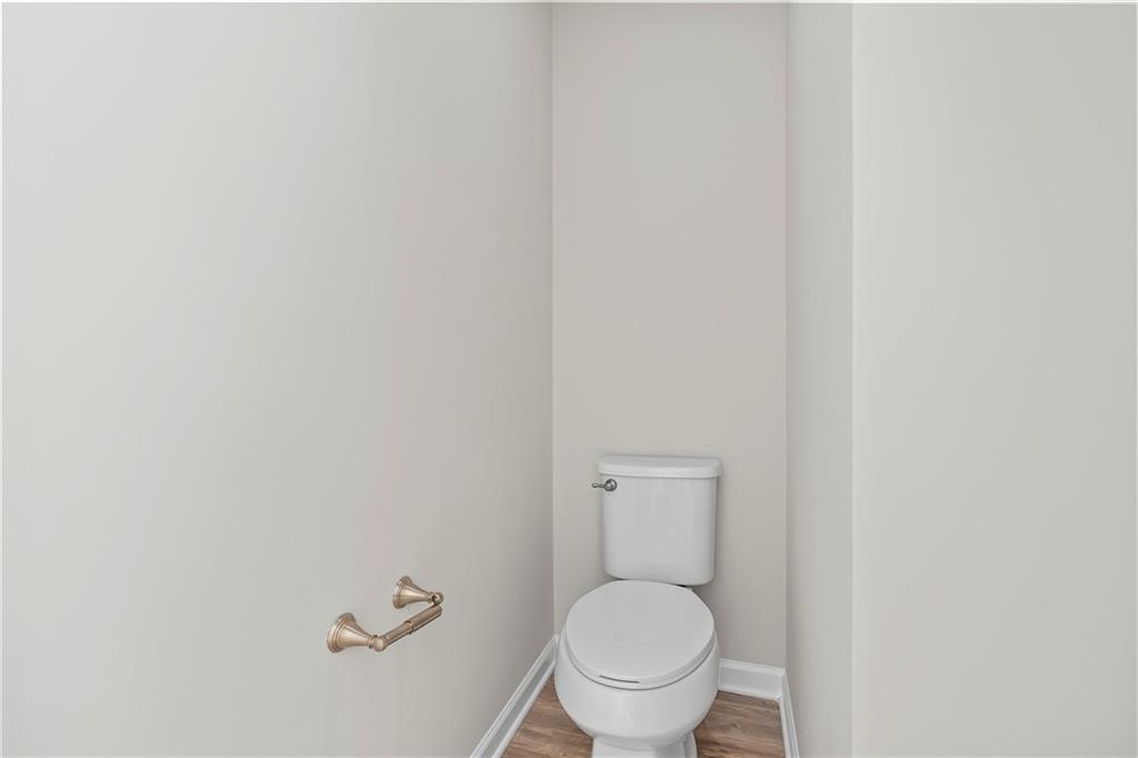 71 Moonrise Crossing Dallas, GA 30132 - Photo 35 of 64 a white toilet sitting next to a white wall