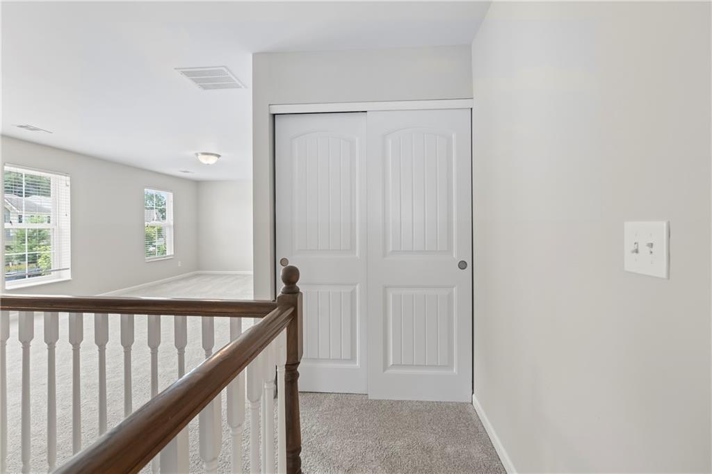 71 Moonrise Crossing Dallas, GA 30132 - Photo 36 of 64 a view of a hallway with windows