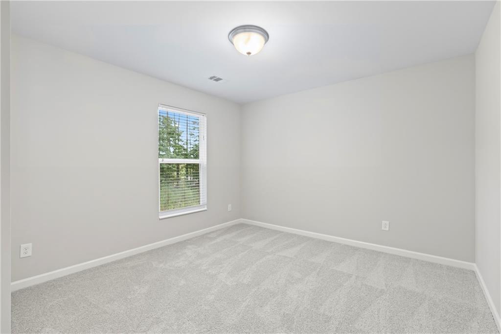 71 Moonrise Crossing Dallas, GA 30132 - Photo 38 of 64 an empty room with a window