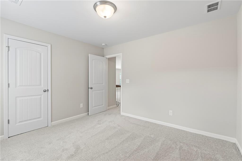 71 Moonrise Crossing Dallas, GA 30132 - Photo 39 of 64 a view of an empty room