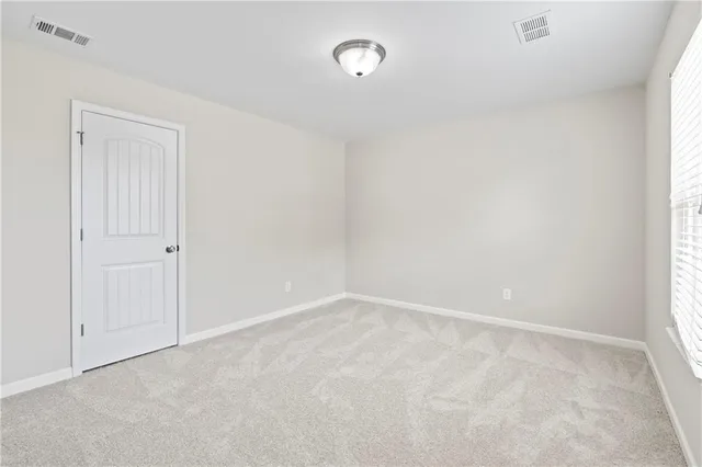 a bathroom with a double vanity sink toilet mirror and bathtub