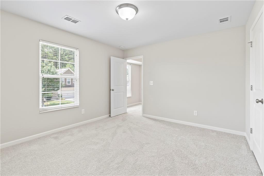 71 Moonrise Crossing Dallas, GA 30132 - Photo 41 of 64 an empty room with windows