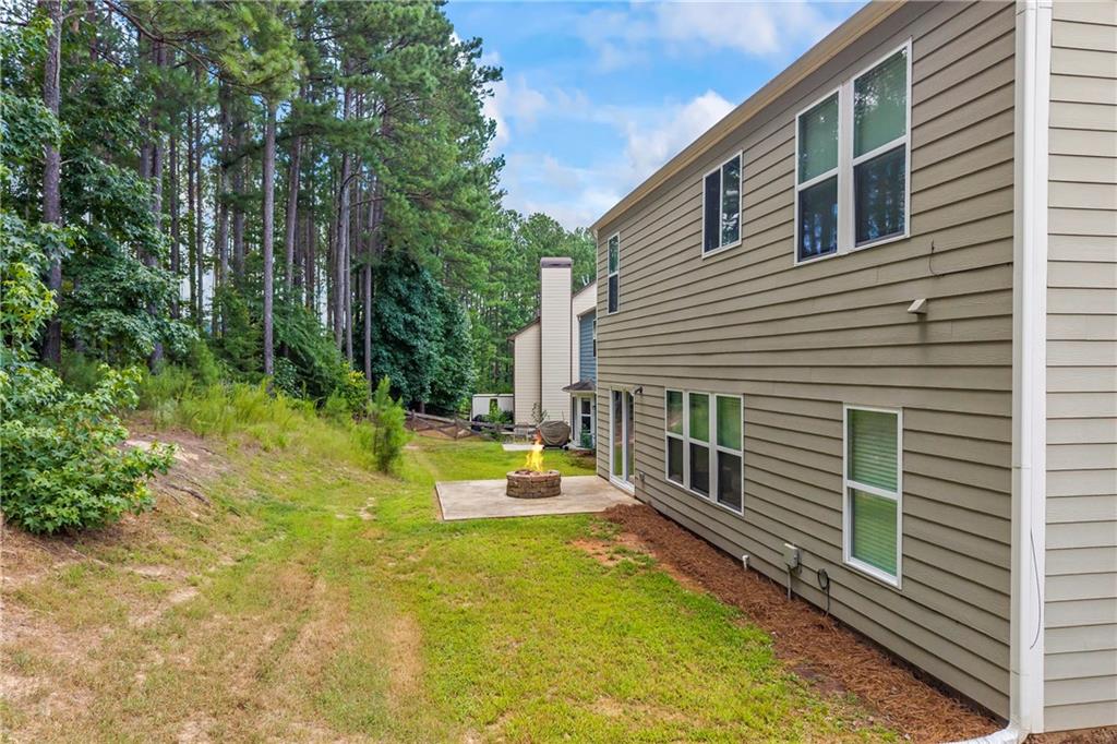 71 Moonrise Crossing Dallas, GA 30132 - Photo 49 of 64 a view of a house with pool and sitting area